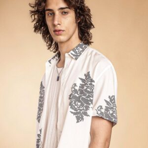 H&M ROSE PATTERNED SHIRTProduct Details Resort shirt in a patterned viscose weave with a regular collar, short sleeves and a straight-cut hem.Print highlight of bold cross stitch indigenous motifs. Size & Fit Regular-Fit The model (height 6') is wearing a size 40 Material & Care Viscose Rayon Machine Wash Specifications Sleeve Length Short Sleeves Collar Spread Collar Fit Regular Fit Brand Fit Name Standard Length Regular Hemline Straight Placket Button Placket Placket Length FullProduct Details Resort shirt in a patterned viscose weave with a regular collar, short sleeves and a straight-cut hem.Print highlight of bold cross stitch indigenous motifs. Size & Fit Regular-Fit The model (height 6') is wearing a size 40 Material & Care Viscose Rayon Machine Wash Specifications Sleeve Length Short Sleeves Collar Spread Collar Fit Regular Fit Brand Fit Name Standard Length Regular Hemline Straight Placket Button Placket Placket Length Full